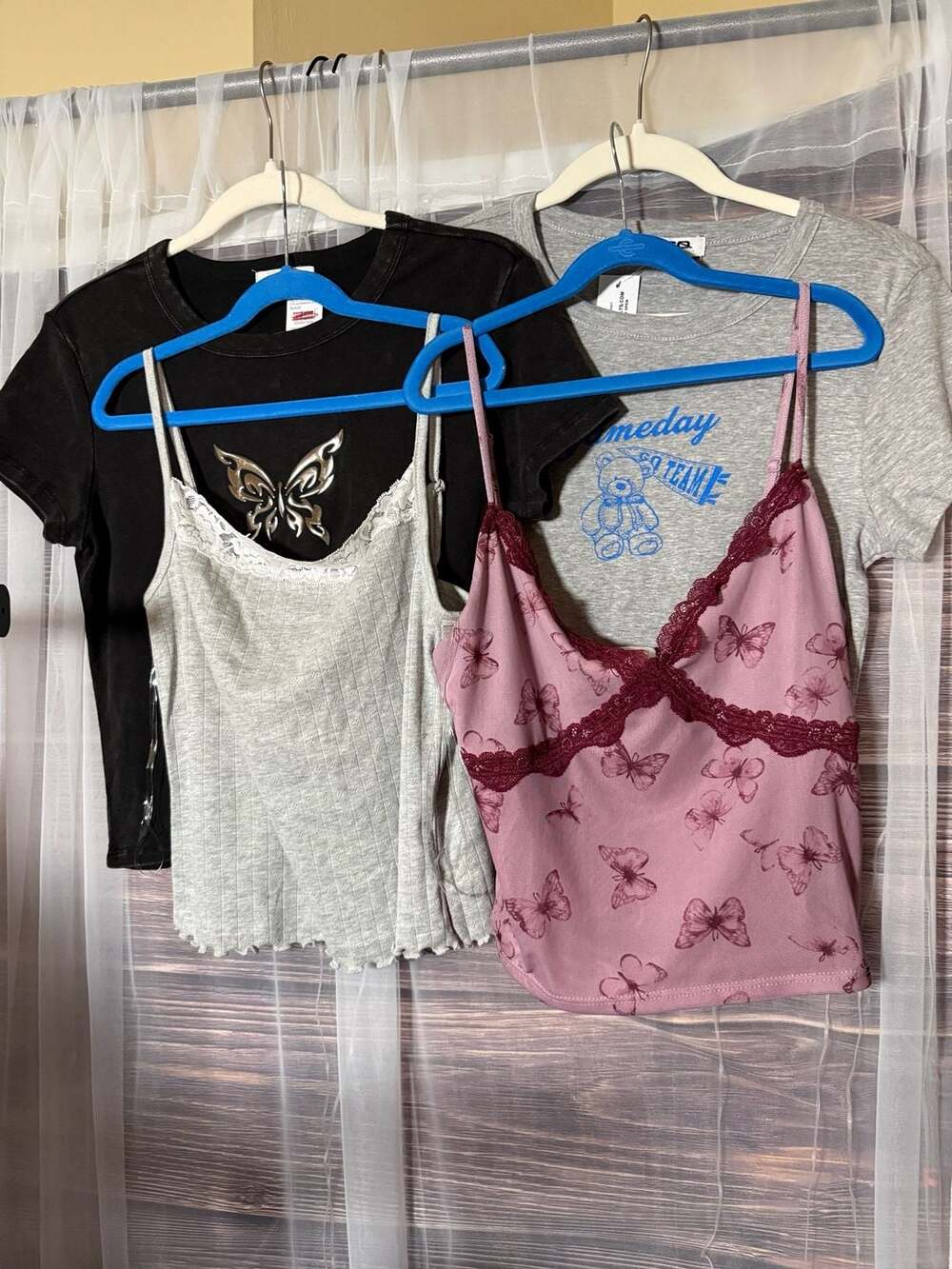 NWT Tilly’s Size Large lot of 4 tops two tees and two tanks.